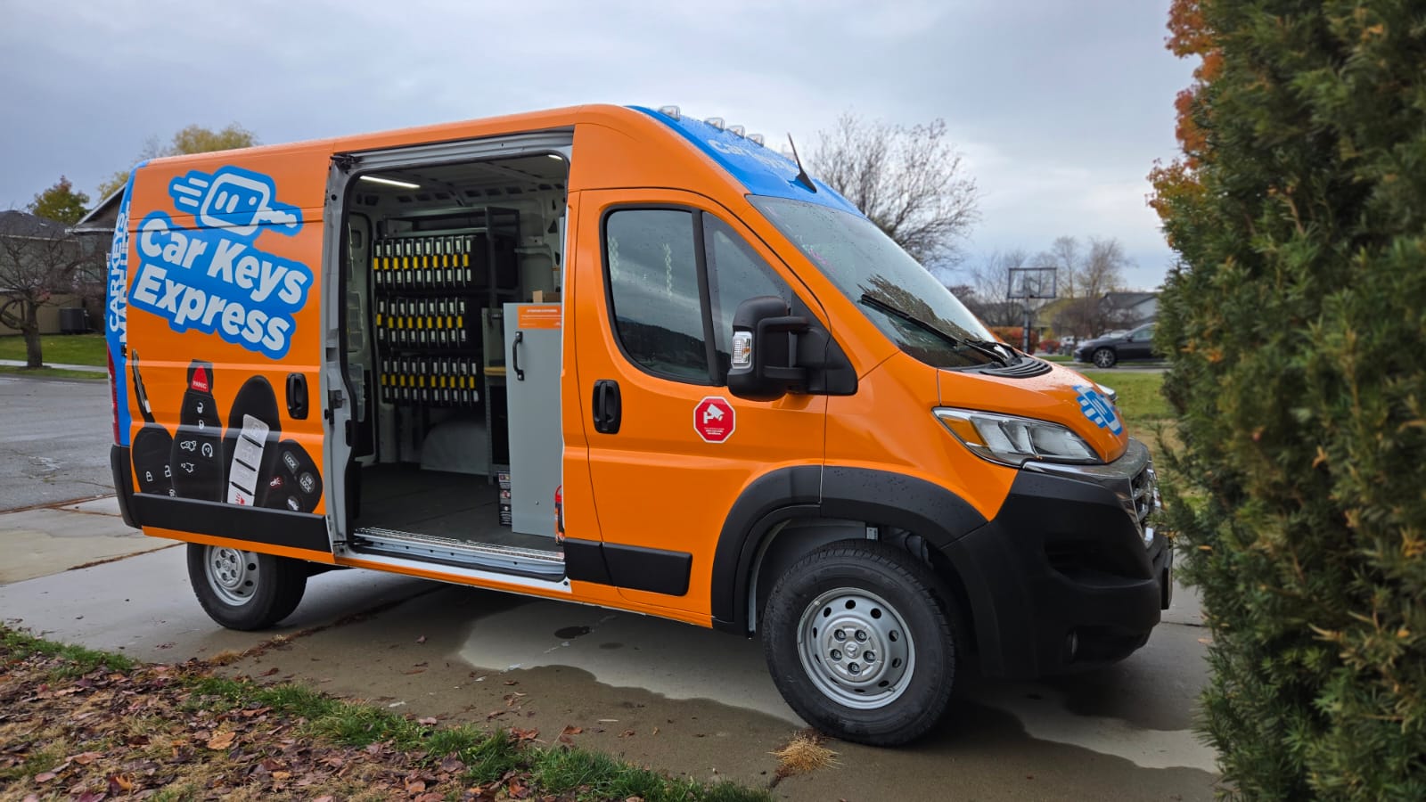 Car Keys Express mobile service van at customer location ready to cut and program keys