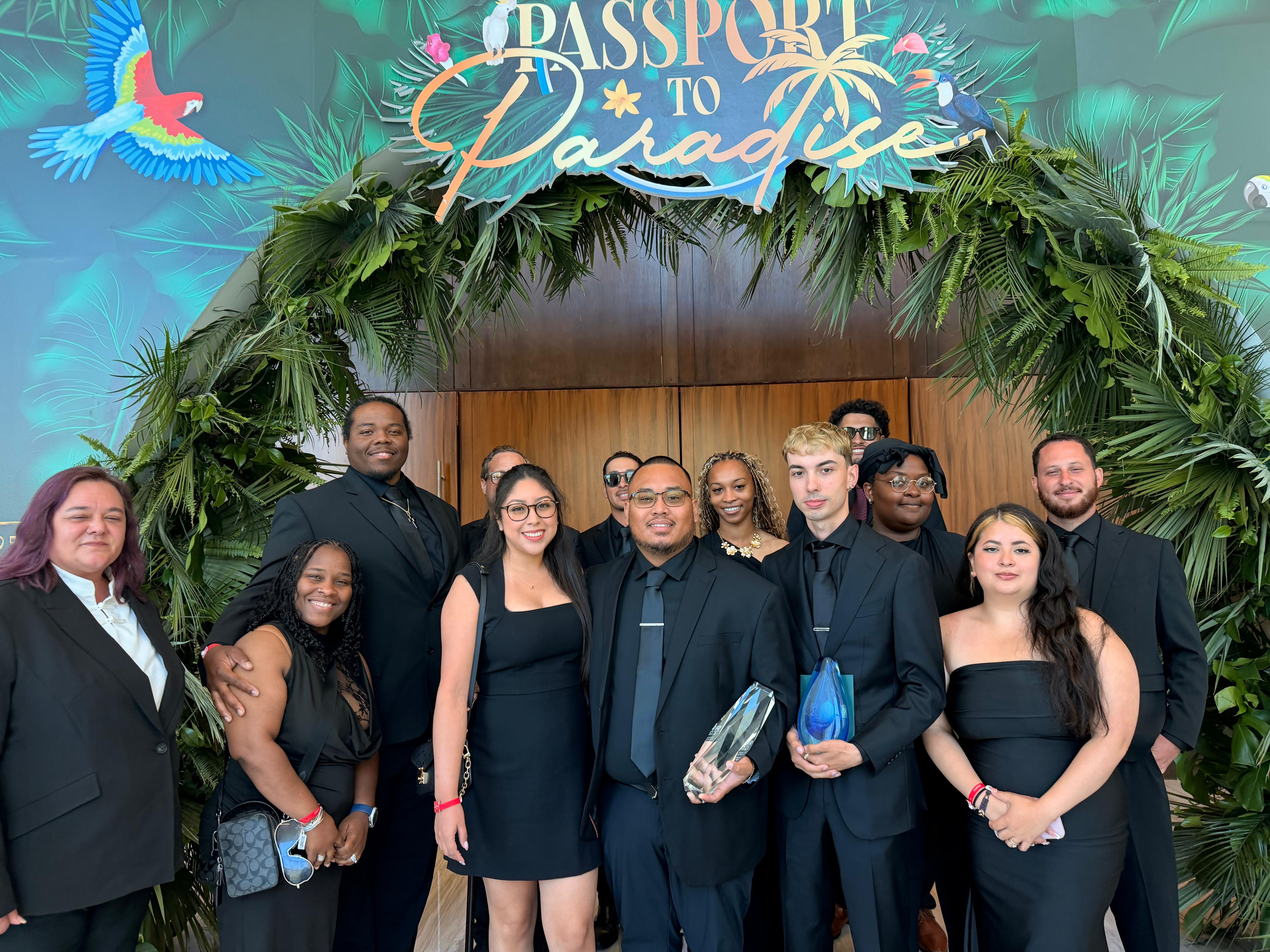 Peak Provisions team receiving award at Passport to Paradise ceremony