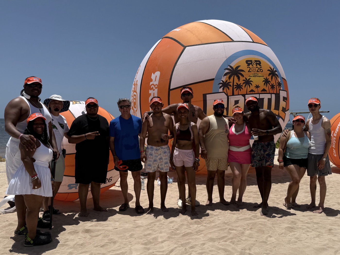 Peak Provisions team at the beach during the 2026 R&R recognition trip in Mexico